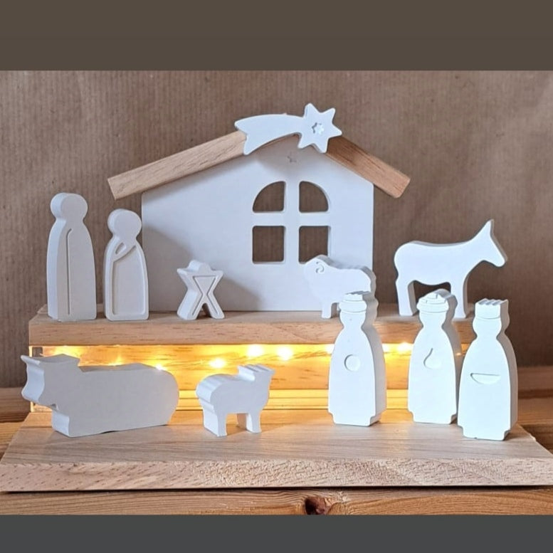 Weihnachtskrippe aus Silikon Gießform Krippe von easy-sticks, zeigt dekorative Figuren wie Maria, Josef, Jesus, Tiere und die Krippe, ideal für kreative DIY-Projekte zur Weihnachtszeit.