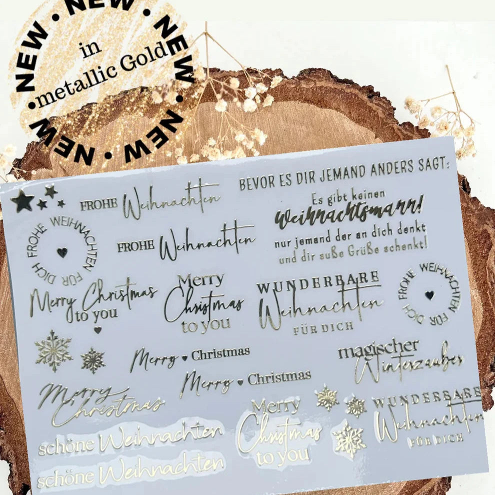 Goldene Rub On Sticker Weihnachten von easy-sticks, metallische Designs in Gold und Schwarz mit Weihnachtsmotiven und freundlichen Sprüchen auf A5. Perfekt für DIY-Projekte und festliche Bastelideen.