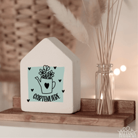 Dekoratives Haus mit Blumentopf-Design und Schriftzug 'Gartenliebe', von easy-sticks, ideal für Bastelprojekte und DIY-Dekorationen