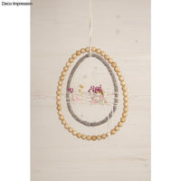 Metallring Ei, 20cm - für dein Oster DIY von easy-sticks: Ein stilvoller Metallring, eingefasst mit Holzkugeln und verziert mit getrockneten Blumen.