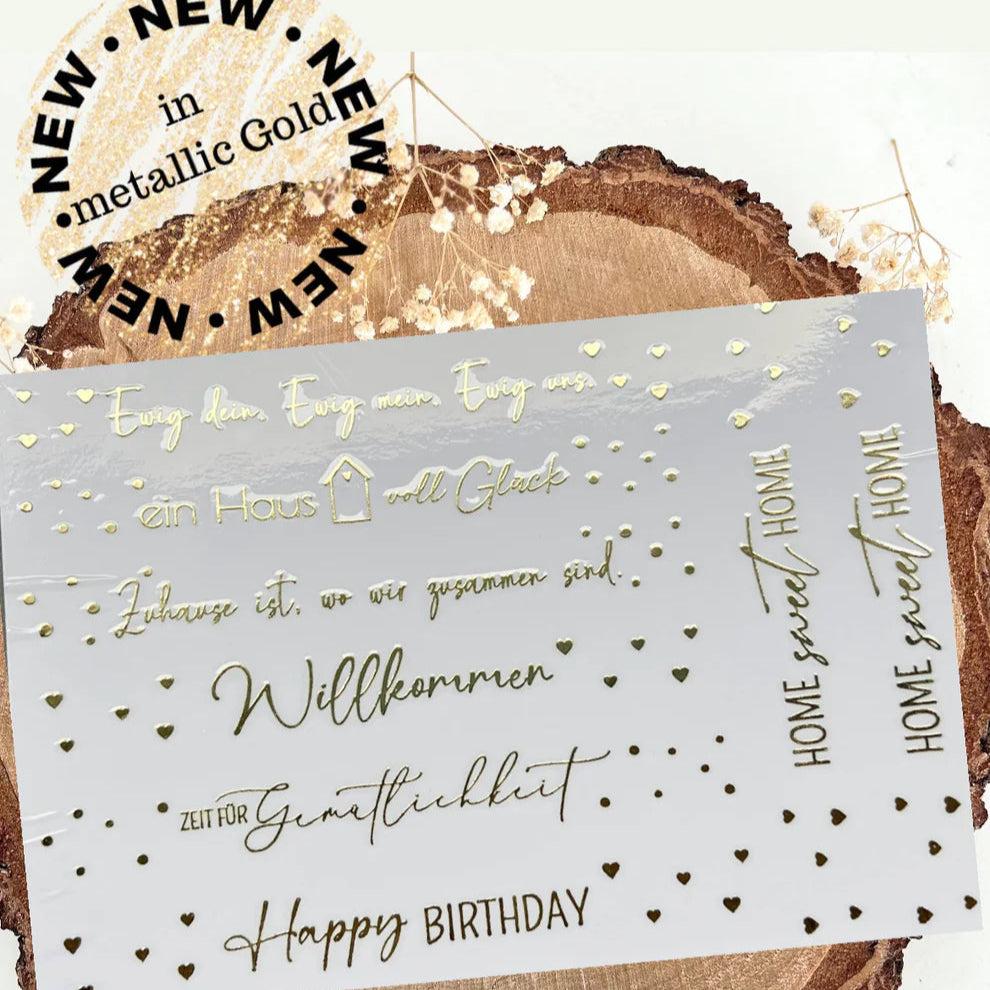 Easy-Stick Rub on UV Sticker randlos Gold von easy-sticks, mit goldenen Sprüchen und Designs auf glattem Hintergrund, ideal für kreative Projekte.