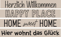 Wanddekor mit Sprüchen "Herzlich Willkommen", "Happy Place", "Home sweet Home" und "Hier wohnt das Glück" im Design von easy-sticks, ideal für ein einladendes Zuhause.