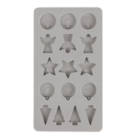 Detailaufnahme der Silikon Gießform Mini-Dekoformen Xmas von easy-sticks; zeigt die Vielfältigkeit der Motive wie Kugeln, Engel und Schneeflocken für individuelle Weihnachtsdekorationen.