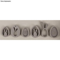 Osteranhänger aus der Silikon-Gießform von Easy-Sticks, präsentiert in Kombination mit natürlichen Materialien für eine ansprechende Deko.