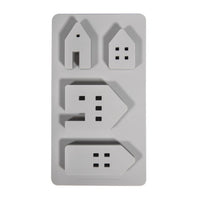 Detailaufnahme der Silikon Gießform Lichthäuser von easy-sticks, zeigt die vier verschiedenen Hausformen zur Herstellung einzigartiger Lichthäuser in präziser Gestaltung.