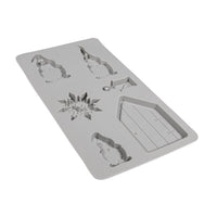 Detailaufnahme der Silikon Gießform Wichtel von easy-sticks, zeigt die sechs verschiedenen fröhlichen Weihnachtsmotive.