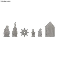 Gießformen von easy-sticks in Aktion, gezeigt sind die fertigen Betonanhänger mit Wichteln, Laterne und einem Schnee-Motiv.