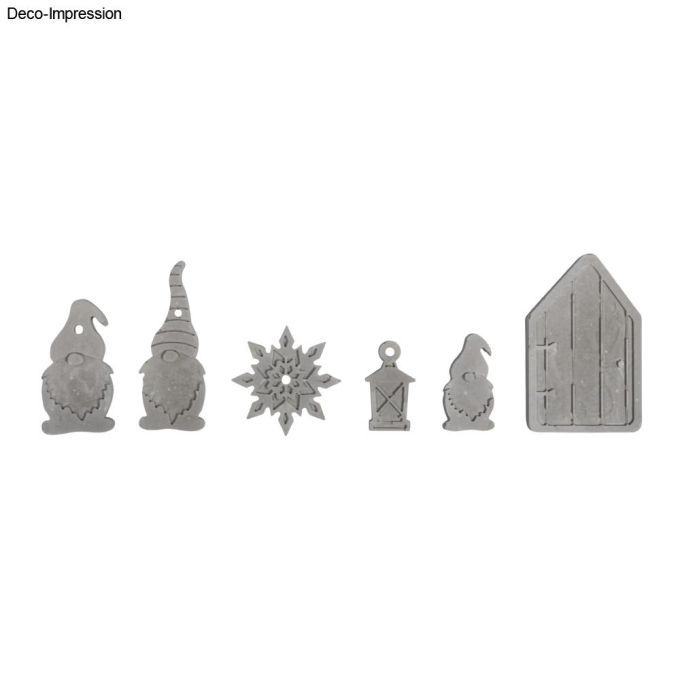 Gießformen von easy-sticks in Aktion, gezeigt sind die fertigen Betonanhänger mit Wichteln, Laterne und einem Schnee-Motiv.