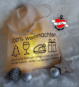 Schöne Geschenktüte mit der Aufschrift '100% Weihnachten' und funkelnden Lichtern, perfekt für kreative Geschenkideen von easy-sticks.