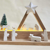 Elegante Silikon Weihnachtskrippe von easy-sticks, kunstvolles Display mit einem leuchtenden Stern und festlichen Tieren in einer Weihnachtslandschaft.