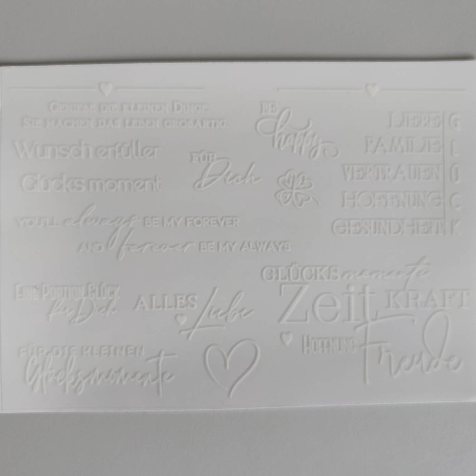 Stylische Rub on UV Sticker von easy-sticks mit ansprechenden Sprüchen wie 'Be happy' und 'Für Dich', ideal zur Verschönerung von Geschenken.
