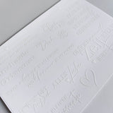 Transparente Rub on Sticker von easy-sticks in edlem Design, mit inspirierenden Botschaften für Glück und Freude auf glattem Hintergrund.