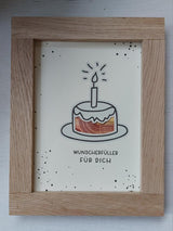 Elegante Rahmung der PDF Druckvorlage von Easy-Sticks. Präsentiert einen dekorativen Kuchen mit der Aufschrift 'Wunscherfüller für dich', ideal für persönliche Geldgeschenke.