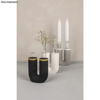 Vielseitige Silikonform - Vase U-Form geriffelt mit 2 Reagenzgläsern von Easy-Sticks, in verschiedenen Farbtönen mit Kerzen und Blumen für ein modernes Ambiente.