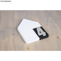 Silikon Gießform 0-9 von easy-sticks mit dem Formabdruck der Zahl 4, perfekt für individuelle Dekorationen.