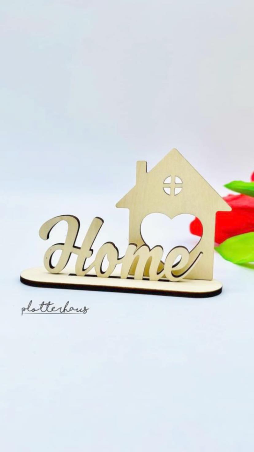 Holz-Dekoration mit dem Schriftzug 'Home' und einem Herz, perfekt für kreative Projekte von easy-sticks – 3 & 4mm Ausstecher Home, Moin, Herz, Mama, Love - Laserdatei.