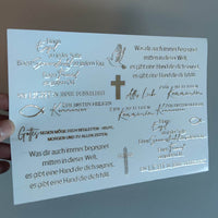 Rub on UV Sticker randlos Gold Sprüche Kommunion/ Konfirmation/ Taufe A5 von easy-sticks, in der Hand gehalten, präsentiert elegante Schriftzüge und christliche Symbole in edlem Gold.