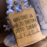 Tragetasche mit dem Spruch "MAN SAGT JA VIEL ZU SELTEN BITTE. DANKE." von easy-sticks, ideal für persönliche Geschenke.