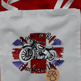 Weiße Tragetasche mit dem Aufdruck 'Born to Ride - Forged to Work' und stilisiertem Motorrad, ein kreatives Produkt von Easy-Sticks.