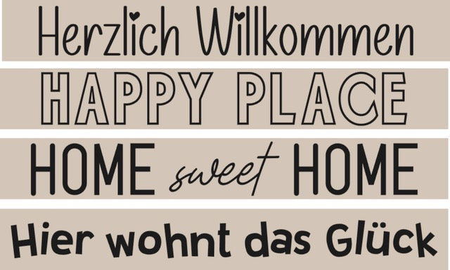 Wanddekor mit Sprüchen "Herzlich Willkommen", "Happy Place", "Home sweet Home" und "Hier wohnt das Glück" im Design von easy-sticks, ideal für ein einladendes Zuhause.