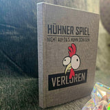 Notizbuch mit dem Design "Hühner Spiel" von easy-sticks, präsentiert ein verspieltes Huhn und den Schriftzug "VERLORREN".