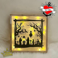 Beleuchtete Halloween Silhouette Friedhof Dekoration von easy-sticks, die eine gruselige Atmosphäre mit Trollen, Geistern und Kürbissen schafft.