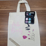 Stoffbeutel mit dem Motiv "Hello Beauty" von easy-sticks, verziert mit buntem Makeup und Glitzer, ideal für kreative Projekte und DIY Ideen.