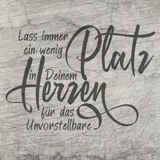 Kreative Gestaltung mit der Plotterdatei "Lass immer ein wenig Platz in deinem Herzen für das Unvorstellbare" von easy-sticks, elegant auf einer Holzoberfläche präsentiert.