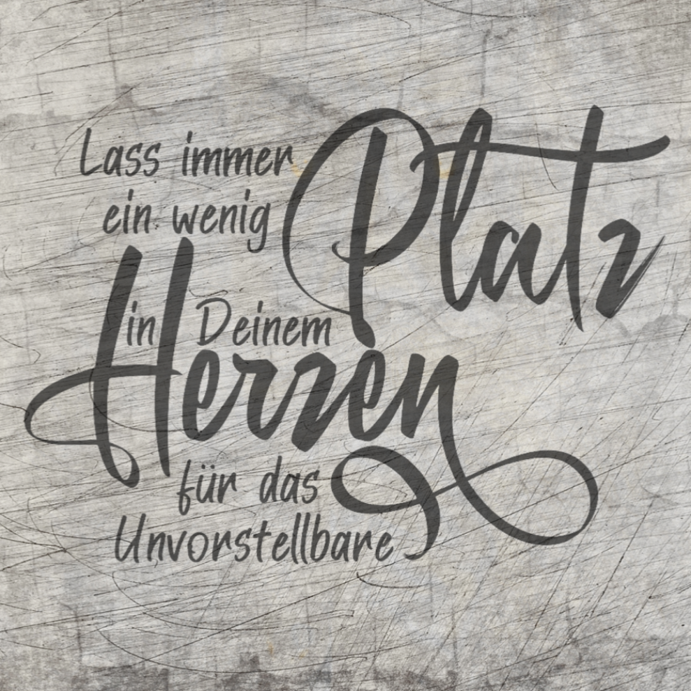 Kreative Gestaltung mit der Plotterdatei "Lass immer ein wenig Platz in deinem Herzen für das Unvorstellbare" von easy-sticks, elegant auf einer Holzoberfläche präsentiert.