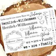 Kreative Rub On UV Sticker von easy-sticks in A5 mit verschiedenen Designs, darunter Willkommenssprüche und familiäre Motive. Ideal für DIY Projekte und Gestaltungsideen.