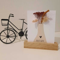 Helle Vase mit dem Text 'ALLES GUTE' und Trockenblumen, Teil der ansprechenden DIY Karten von easy-sticks.
