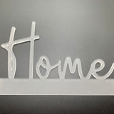Dekorative Anwendung des Easy-Sticks Acryl Aufstellers 'Home' in einem wohnlichen Umfeld, um eine einladende Atmosphäre zu schaffen.