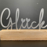 Eleganter satiniert Acryl Aufsteller von Easy-Sticks mit der Aufschrift 'Glück', perfekt geeignet für eine charmante Deko in deinem Zuhause.
