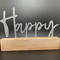 Elegante Acryl Aufsteller von Easy-Sticks mit dem Schriftzug 'Happy'. Ideal für stilvolle Dekoration und als Geschenk.