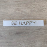 Minimalistischer Acryl-Easy-Stick 'BE HAPPY' von Easy-Sticks, auf Holzoberfläche präsentiert, ideal für kreative DIY-Projekte.
