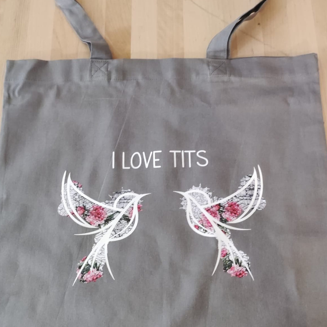 Schicke Einkaufsbeutel mit floralem Design und dem Schriftzug 