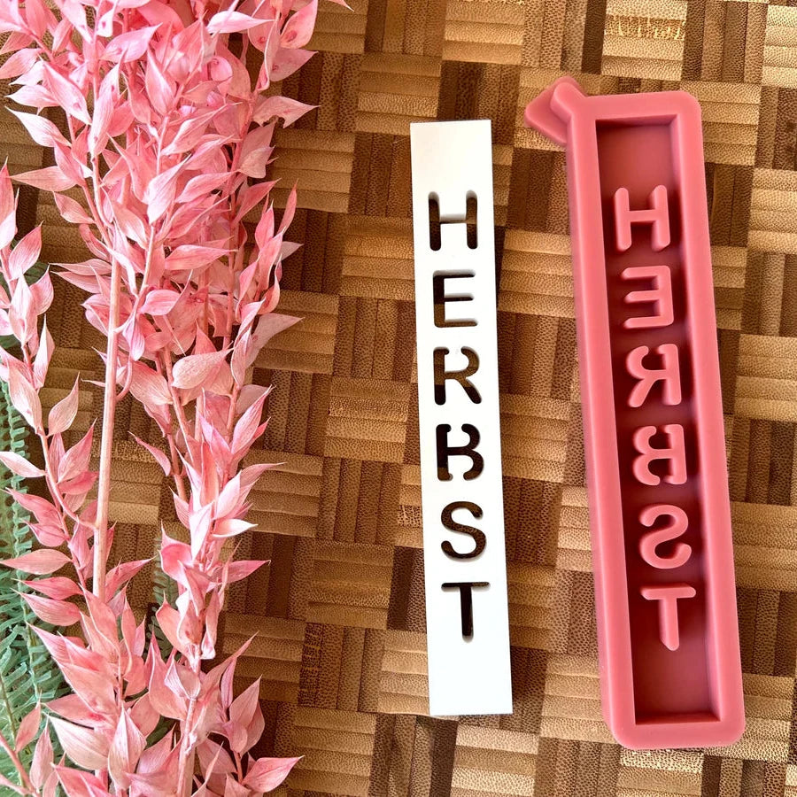 Easy-Sticks Silikonform 'Herbst' mit pinken und weißen Gießformen, um einzigartige Windlichter oder Lichthäuser zu gestalten. Perfekt für kreative DIY-Projekte.