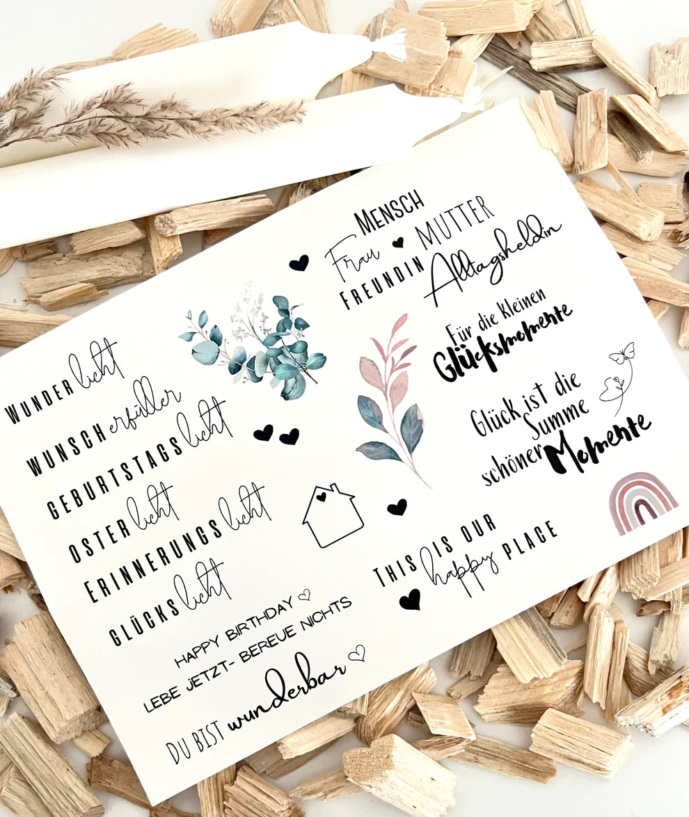 Kerzentattoo A5 Wasserschiebefolie Teil 2 von easy-sticks, zeigt eine elegante Auswahl filigraner Motive und stimmungsvoller Sprüche, ideal für die Verschönerung von Kerzen zu festlichen Anlässen.