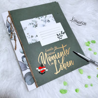 Notizbuch mit dem Schreibschrift-Text 'Genieße die schönen Momente im Leben', designt mit der Plotterdatei von easy-sticks.