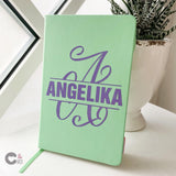 Monogramm 'A' Plotterdatei von easy-sticks; personalisiertes Notizbuch in mintgrün mit dem Namen 'ANGELIKA', perfekt für individuelle Geschenkideen.