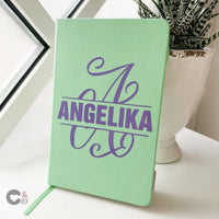 Monogramm 'A' Plotterdatei von easy-sticks; personalisiertes Notizbuch in mintgrün mit dem Namen 'ANGELIKA', perfekt für individuelle Geschenkideen.