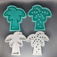 Zwei Silikonformen in Palmenshape von Easy-Sticks, eine transparent und eine opake, perfekt fürs Gießen.