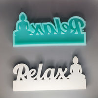 Zwei Silikonformen in mintgrün und weiß von Easy-Sticks, beide mit dem Schriftzug 'Relax' und einer Buddha-Illustration - Kreatives Bastelmaterial
