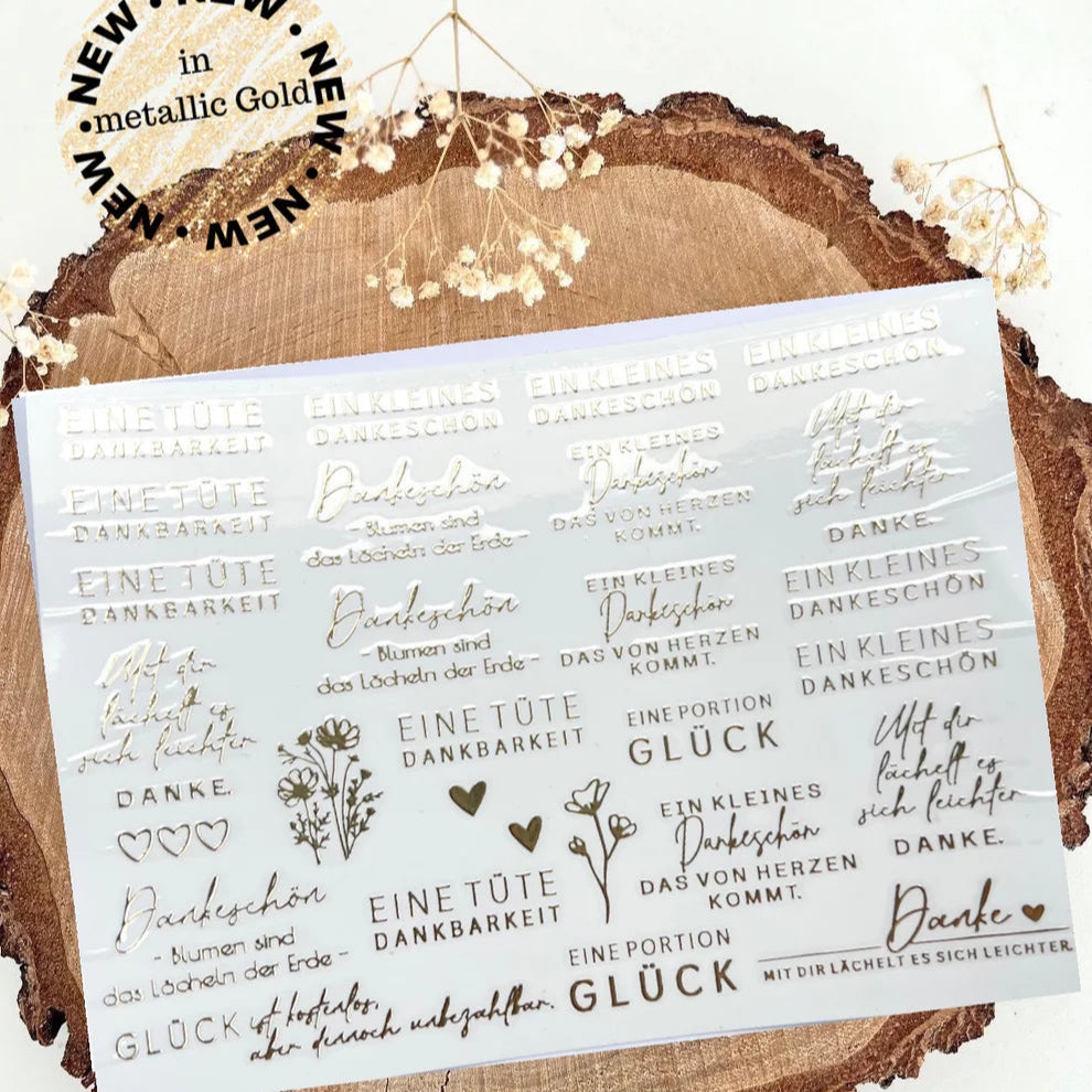 Rub on UV Sticker randlos gold Dankbarkeit A5 von easy-sticks. Edle metallic goldene Aufkleber mit verschiedenen Dankes-Sprüchen und floralen Motiven auf klarer Folie.