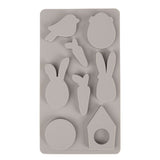 Detailaufnahme der Silikonform 'Happy Spring' von Easy-Sticks mit verschiedenen Formen wie Hase, Vogel, und Karotten, geeignet für kreative Bastelideen.