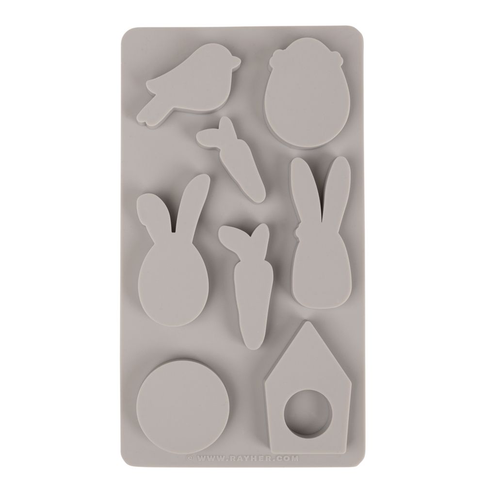 Detailaufnahme der Silikonform 'Happy Spring' von Easy-Sticks mit verschiedenen Formen wie Hase, Vogel, und Karotten, geeignet für kreative Bastelideen.