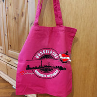 Braune Tragetasche mit dem Druck "Düsseldorf Nordrhein-Westfalen" und Skyline-Motiv, inspiriert von der Stempel Skyline Düsseldorf Plotterdatei von easy-sticks.