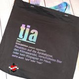 Schicke schwarze Tragetasche mit dem Schriftzug 'tja' in schimmernden Farben von easy-sticks, ideal für kreative Projekte.