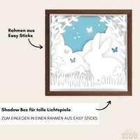 Elegante Shadow Box mit einem Osterhasen, erstellt mit der Osterhase Plotterdatei von easy-sticks. Die Box hebt eine harmonische Farbgestaltung hervor und eignet sich hervorragend für kreative Lichtspiele in der Osterzeit.
