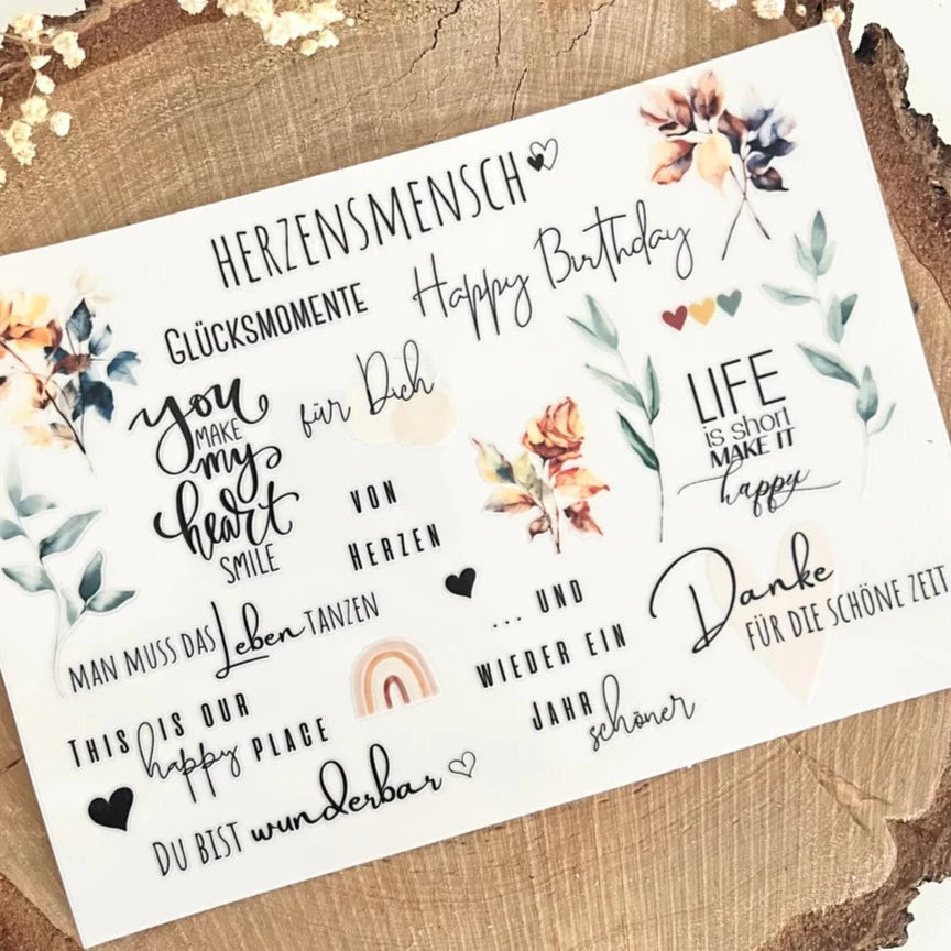 Rub on UV Sticker randlos Mix3 A5 von easy-sticks mit kreativen Schriftzügen und floralen Motiven für DIY-Projekte, ideal für persönliche Geschenke.